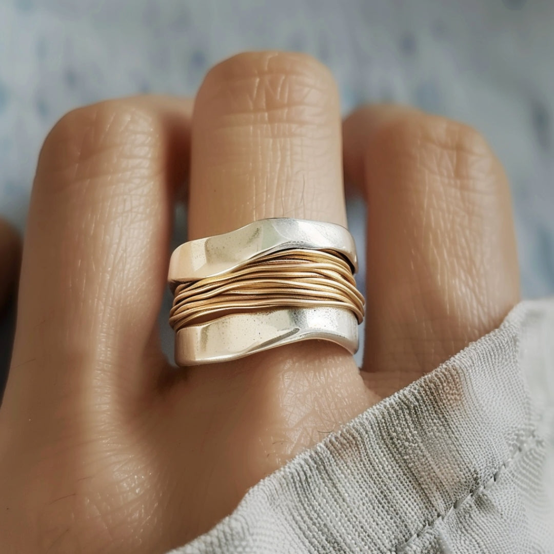 BAGUE EN MÉTAUX MÉLANGÉS VAGUES DORÉES