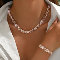 ENSEMBLE DE BIJOUX MAILLONS FEUILLES EN OR ROSE