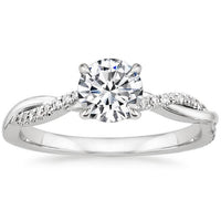 BAGUE SOLITAIRE TORSADÉE EN OR