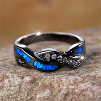 BAGUE TORSADÉE OPALE BLEUE AURORE