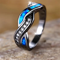BAGUE TORSADÉE OPALE BLEUE AURORE