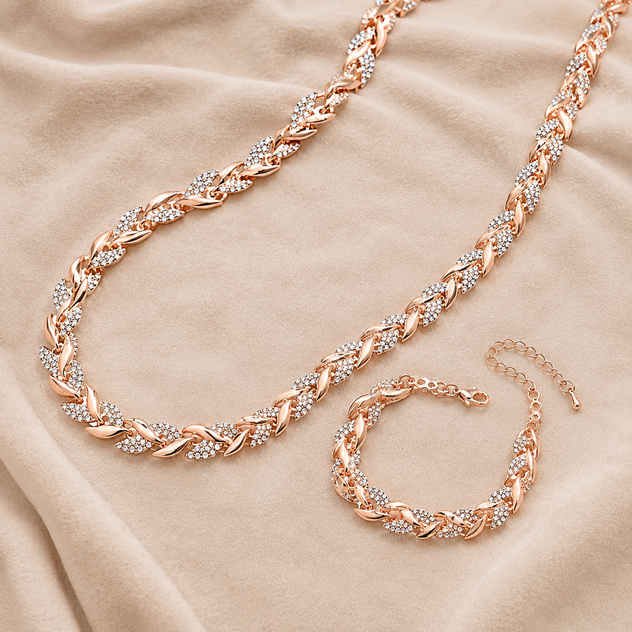 ENSEMBLE DE BIJOUX MAILLONS FEUILLES EN OR ROSE