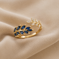 BAGUE FEUILLE DORÉE AU SAPHIR