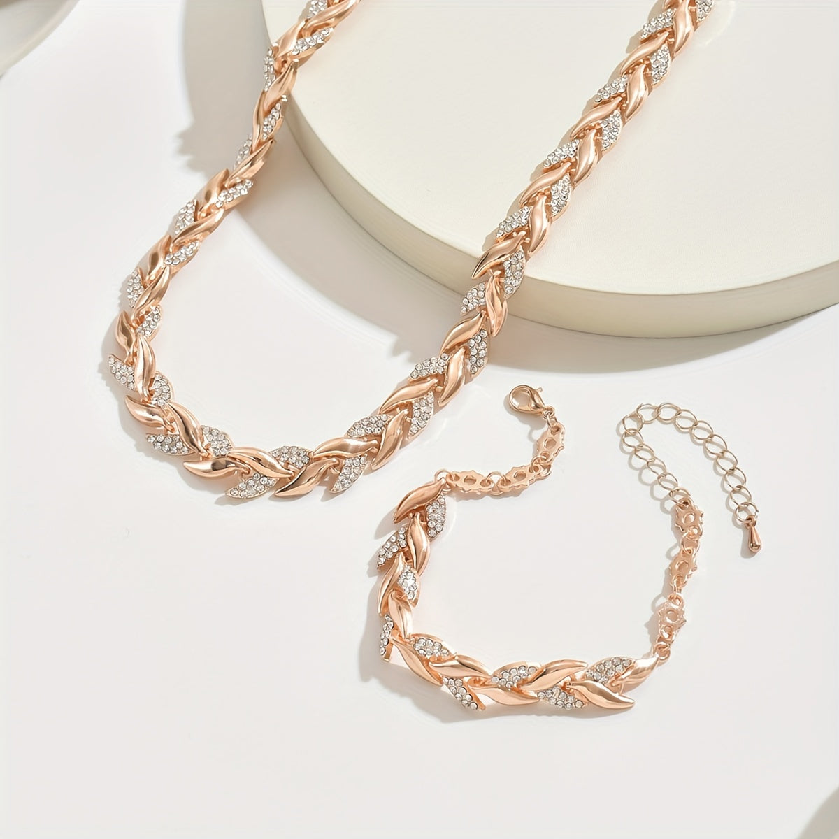 ENSEMBLE DE BIJOUX MAILLONS FEUILLES EN OR ROSE