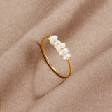 BAGUE EN OR DÉLICATE AUX PERLES D'EAU DOUCE