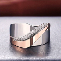 BAGUE CROISÉE EN ARGENT ET OR ROSE AVEC ZIRCONIUMS