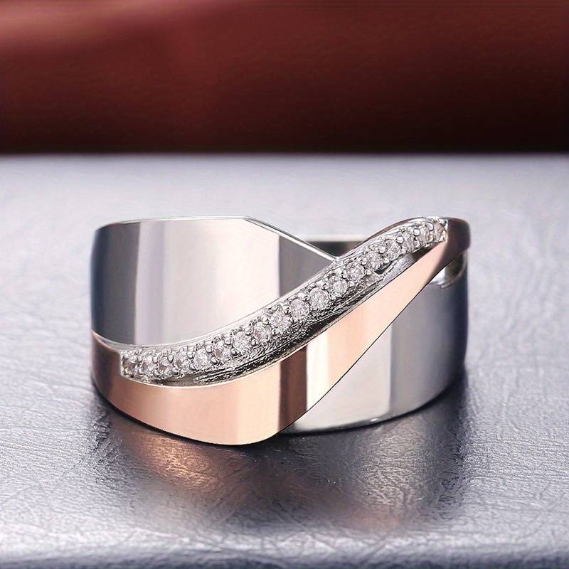 BAGUE CROISÉE EN ARGENT ET OR ROSE AVEC ZIRCONIUMS